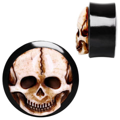 Organic Horn Saddle Plug with Bone Skull Inlay.