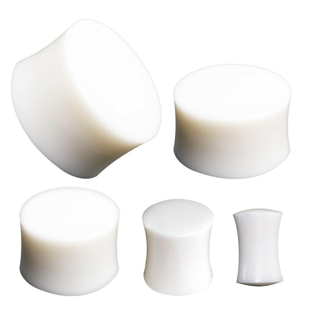 Organic White Buffalo Bone Saddle Ear Plug.